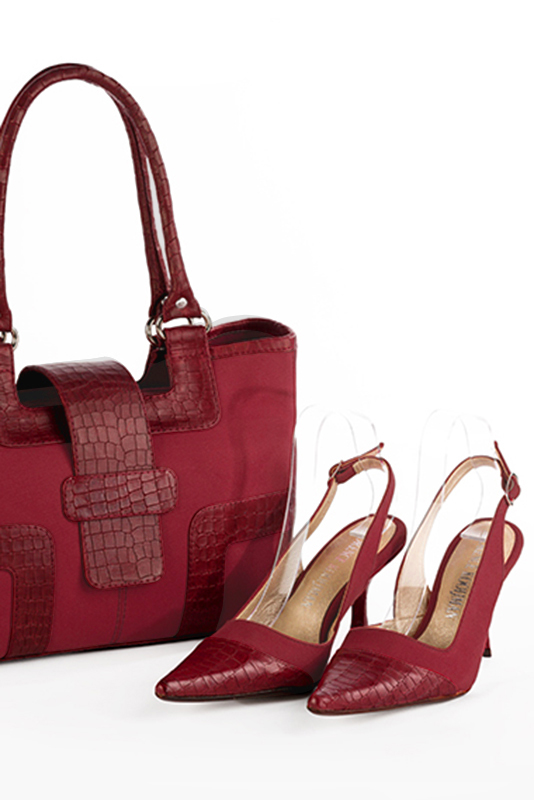 Burgundy red women's slingback shoes. Pointed toe. High spool heels. Worn view - Florence KOOIJMAN